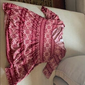 Patterned burgundy Wet Seal blouse.
